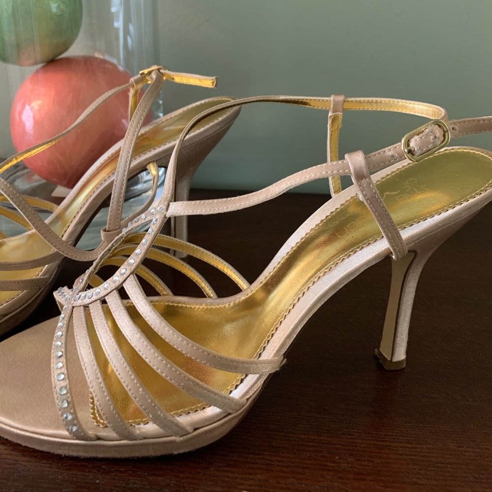 Women’s gold strapped sandals size 9.5. 4 in/heel